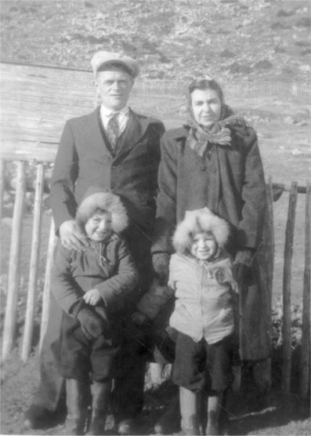 646: Patrick Norman, his wife Anastasia Lambe, their children Francis and Michael (hidden in the center front)  and Victor Lambe. (circa 1949) [courtesy of Julia (Carroll) Best]  - Patrick son of Garrett Norman &amp;amp; Bridget Whelan; Anastasia daughter of Michael Lambe &amp;amp; Johanna Best;  Victor son of Michael Lambe &amp;amp; Julia Carroll